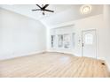 Bright living room featuring hardwood floors and a bay window at 2409 Causey Dr., North Myrtle Beach, SC 29582