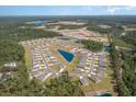 Aerial view of Auberge Woods community with new homes and ponds at 715 Rupert Dr, Conway, SC 29526