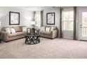Living room with neutral colored couch and two end tables at 1088 Oak Meadow Dr., Conway, SC 29526