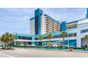 Beautiful exterior view of Landmark Resort featuring direct access to the street and covered parking at 1501 S Ocean Blvd. # 1442, Myrtle Beach, SC 29577