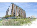 Spacious resort building featuring multiple balconies with ocean views and easy beach access at 1501 S Ocean Blvd. # 1442, Myrtle Beach, SC 29577