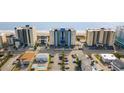 Oceanfront complex, beach views, multiple buildings, parking area at 4619 S Ocean Blvd. # 207, North Myrtle Beach, SC 29582