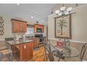 Kitchen features granite countertops, stainless steel appliances, and wood cabinets at 6001-1909 S Kings Hwy., Myrtle Beach, SC 29575