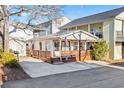 Quaint beach cottage, nicely landscaped front yard at 6001-5732 S Kings Hwy., Myrtle Beach, SC 29575