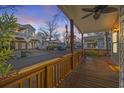 Relaxing front porch with ceiling fan overlooking the street at 6001-5732 S Kings Hwy., Myrtle Beach, SC 29575
