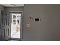 Interior view of the entryway with open door to the porch at 602 Stacey Ct., Georgetown, SC 29440