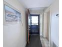 Inviting entryway with tiled flooring and a beautiful artwork at 645 Retreat Beach Circle, Pawleys Island, SC 29585