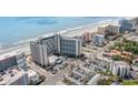 Expansive aerial view showcasing the prime location of the oceanfront resort with ample parking at 7100 Ocean Blvd. # 223, Myrtle Beach, SC 29572