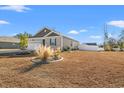 Well-maintained home with a fenced yard and landscaping at 747 Coquina Bay Dr., Conway, SC 29526