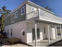This two story home features an outdoor patio on its second story at 931 Edge Dr., North Myrtle Beach, SC 29582