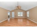 Spacious living area featuring hardwood floors and a vaulted ceiling at 204 Atoll Dr., Myrtle Beach, SC 29588