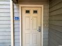 Close-up of the front door of unit 18C showcasing the entry and unit number at 222 Westleton Dr. # 18-C, Myrtle Beach, SC 29572
