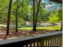 Picturesque view from the home overlooking a tranquil pond surrounded by lush greenery at 222 Westleton Dr. # 18-C, Myrtle Beach, SC 29572