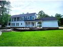Two-story home with a large yard and covered porch is under construction at 239 Madison Dr., Georgetown, SC 29440