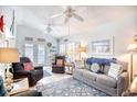 Comfortable living room with vaulted ceiling and coastal décor at 6001-Z16 S Kings Hwy., Myrtle Beach, SC 29575