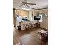 Bright kitchen features wood cabinets, modern appliances, and a breakfast bar at 9502 Knights Ct., Myrtle Beach, SC 29572