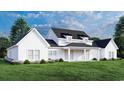 Back view of a white farmhouse with a large covered patio at 2172 Pettus Way, Surfside Beach, SC 29575
