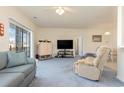 Living room with couches, TV, and access to other rooms at 1058 Sea Mountain Hwy. # 1-303, North Myrtle Beach, SC 29582