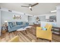 Open concept living room, kitchen, and dining area at 1356 Glenns Bay Rd. # 208M, Surfside Beach, SC 29575