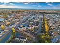 Expansive aerial shot of a community featuring condos, winding waterways, and vibrant coastal scenery at 2060 Cross Gate Blvd. # 204, Surfside Beach, SC 29575