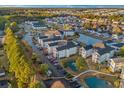 Scenic aerial perspective of a charming residential area with condos, ponds, and lush landscaping at 2060 Cross Gate Blvd. # 204, Surfside Beach, SC 29575
