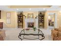 Elegant living room showcasing a fireplace and sophisticated decor at 9547 Edgerton Dr. # 904, Myrtle Beach, SC 29572