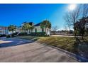 View of the house from the side, highlighting its curb appeal at 1204 Wading Heron Rd., North Myrtle Beach, SC 29582