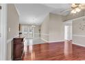 Spacious living room featuring hardwood floors and ample natural light at 290 Georgia Mae Loop, Conway, SC 29527
