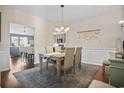 Bright dining room with light walls and a wooden table at 3210 Volterra Way, Myrtle Beach, SC 29579