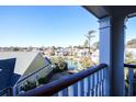 View from a balcony overlooking a peaceful waterfront community at 429 Ocean Pointe Ct., North Myrtle Beach, SC 29582