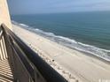 Stunning ocean view from the balcony overlooking the sandy beach at 7100 N Ocean Blvd. # 1608, Myrtle Beach, SC 29572