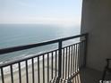 Relax on the balcony with views of the ocean and sandy beach at 7100 N Ocean Blvd. # 1608, Myrtle Beach, SC 29572