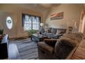 Comfortable living room featuring neutral colors, modern furniture, and ample natural light at 141 Baylee Circle, Galivants Ferry, SC 29544