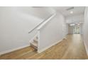 Light and bright entryway with hardwood floors and staircase at 219 Marauder Dr., Longs, SC 29568
