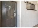 Exterior condo entrance with dark gray door, number 201 at 2310 North Ocean Blvd. # 201, Myrtle Beach, SC 29577