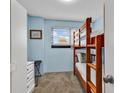 Cozy bedroom featuring a wooden bunk bed, perfect for children or guests at 4111 S Ocean Blvd. # 701, North Myrtle Beach, SC 29582