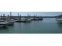 Picturesque view of boats docked along the Pawleys Island waterfront at 42 Mud Minnow Dr., Pawleys Island, SC 29585