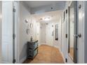 Bright condo entryway with tile floors and coastal decor at 4800 S Ocean Blvd. # 1007, North Myrtle Beach, SC 29582