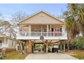 Beach home with spacious deck and carport at 6001 - 7032 S Kings Hwy., Myrtle Beach, SC 29575