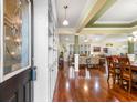 Bright entryway with built-in shelving and hardwood floors at 645 Lafayette Park Dr., Little River, SC 29566