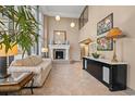 Elegant lobby with a fireplace, neutral tones, and tasteful decorations, creating a welcoming ambiance at 100 Ocean Creek Blvd. # J1, Myrtle Beach, SC 29572