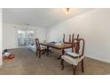 Bright living room with sliding glass doors, carpet, and plenty of space for furniture at 1025 Carolina Rd. # Y-1, Conway, SC 29526