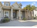 Inviting front entrance with stone pillars, double doors, and decorative accents at 1422 Bohicket Ct., Myrtle Beach, SC 29579