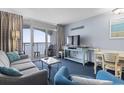Living room with ocean view and balcony access at 2000 N Ocean Blvd. # Ph 3, Myrtle Beach, SC 29577