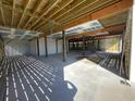 Unfinished basement with concrete flooring and exposed beams at 214 Olde Harbour Ct, Little River, SC 29566