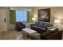 Living room with sofa, chair, coffee table, and picture at 241 Presidential Dr., Surfside Beach, SC 29575