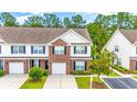 Townhome community view, showing multiple two-story homes at 257 Connemara Dr. # E, Myrtle Beach, SC 29579