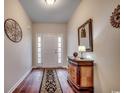 Bright and spacious entryway with hardwood floors and elegant decor at 4060 Woodcliffe Dr., Conway, SC 29526