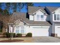 Two-story townhome with attached garage and landscaping at 6095 Catalina Dr. # 2611, North Myrtle Beach, SC 29582