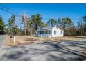 One-story house with a large yard and a paved driveway at 616 West Virginia Rd., Georgetown, SC 29440